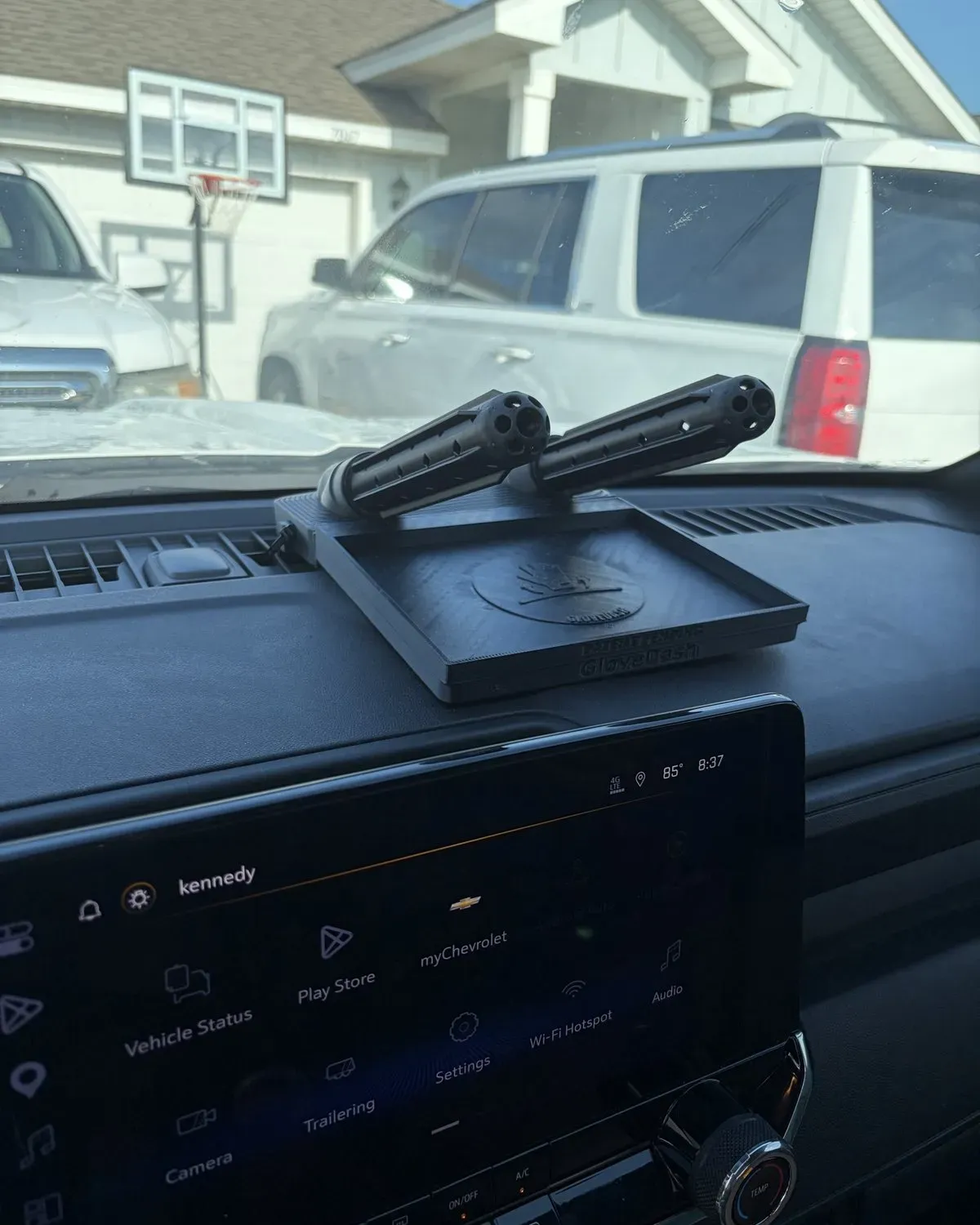 Black GloveDash mounted on a customer's Chevrolet dashboard